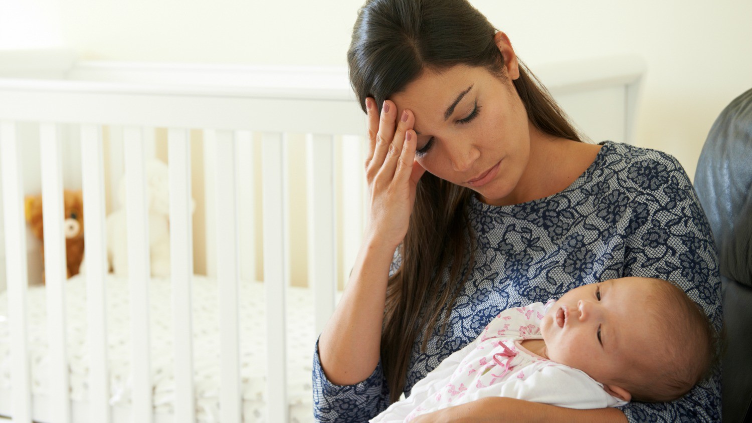 Tired Mother Suffering From Post Natal Depression